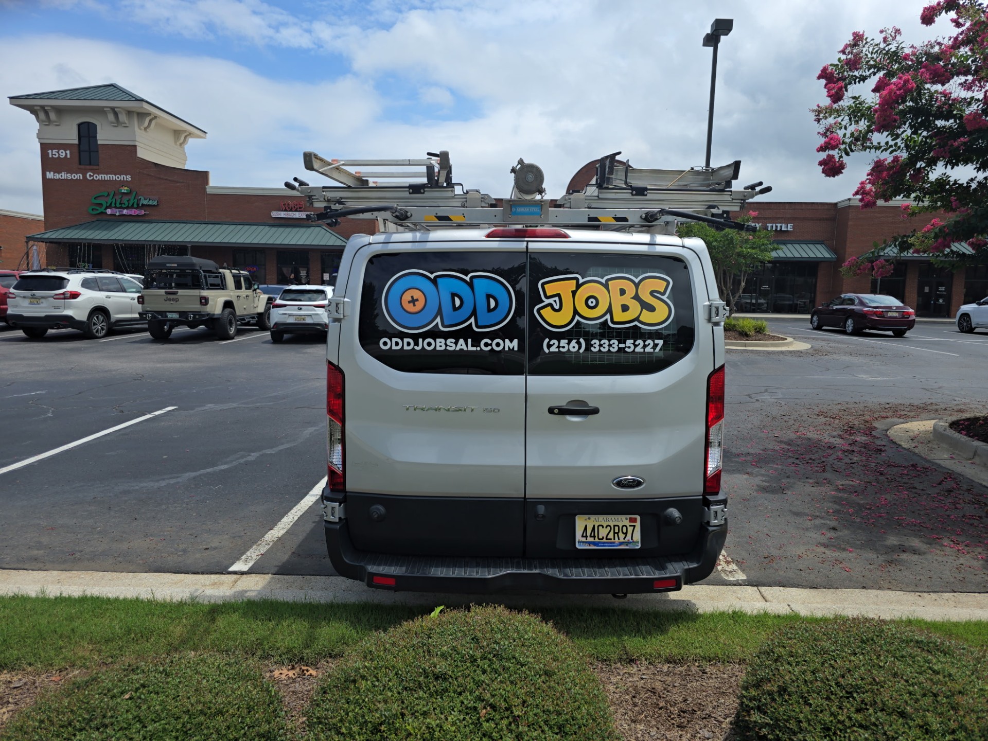 Odd Jobs work van parked at Madison Commons in Madison, AL